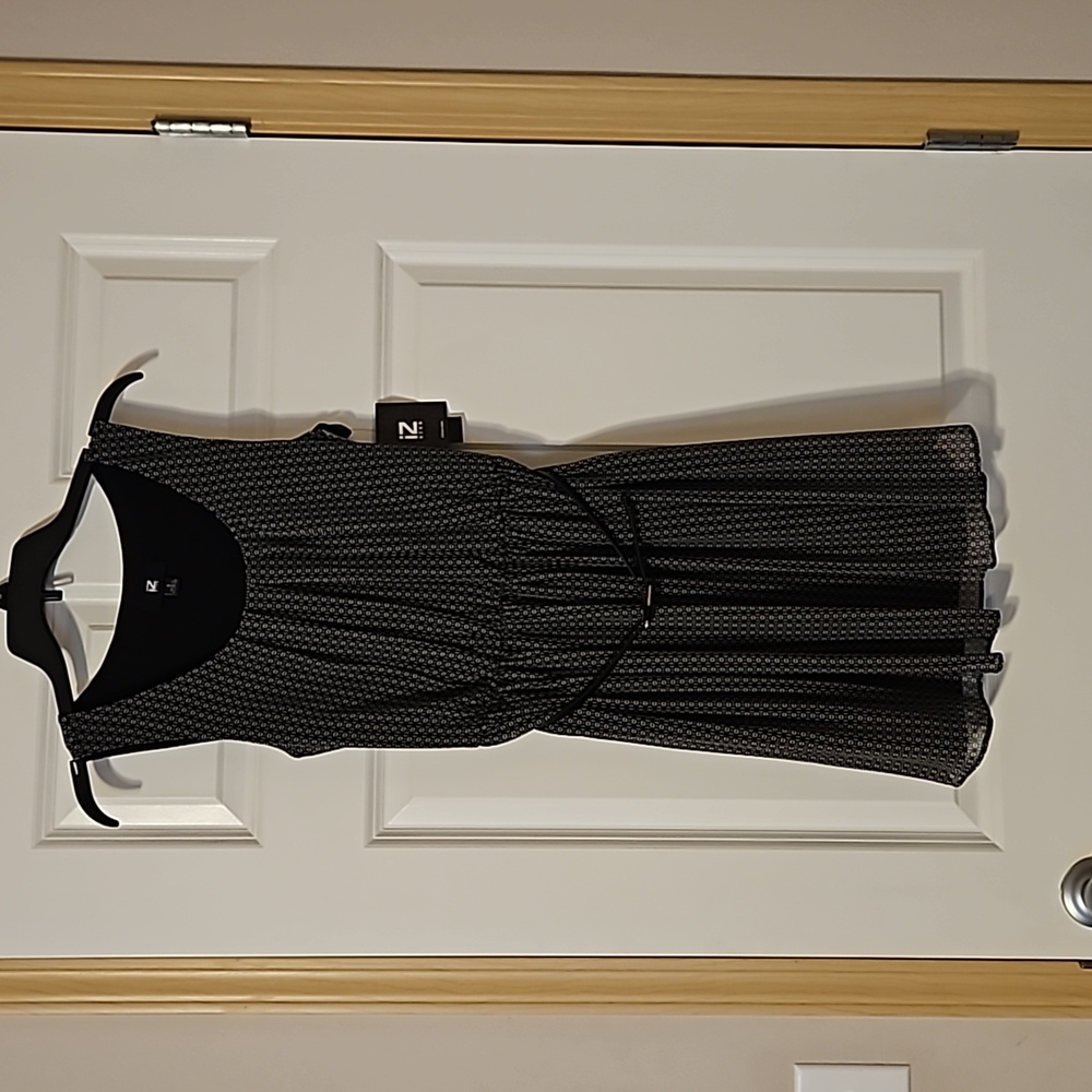 iZ Byer dress. Size Small. Black with sheer print.